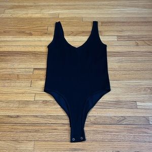 Black Ribbed Bodysuit - size M/L, never worn